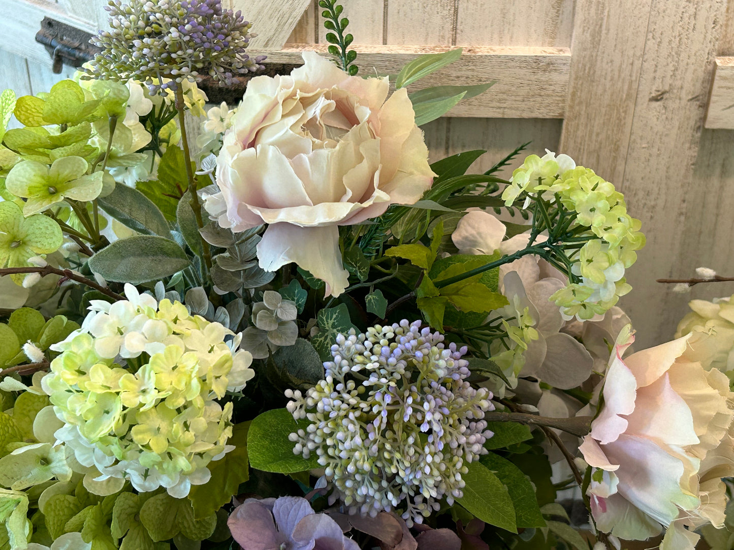 Arrangement for Sale - Fall Green Pumpkins Filled with Pink Roses, Purple Hydrangeas and Green Florals