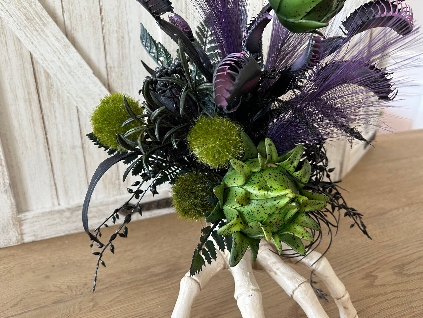 Arrangement for Sale - Halloween Arrangement with Skull Hand and Creepy Florals
