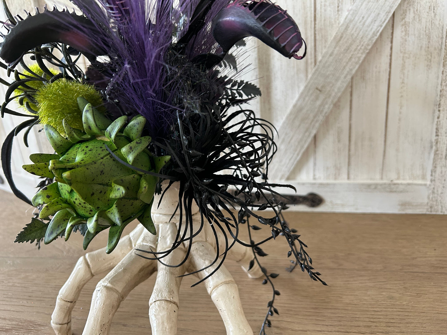 Arrangement for Sale - Halloween Arrangement with Skull Hand and Creepy Florals