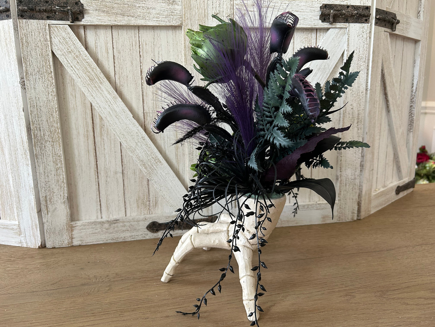 Arrangement for Sale - Halloween Arrangement with Skull Hand and Creepy Florals