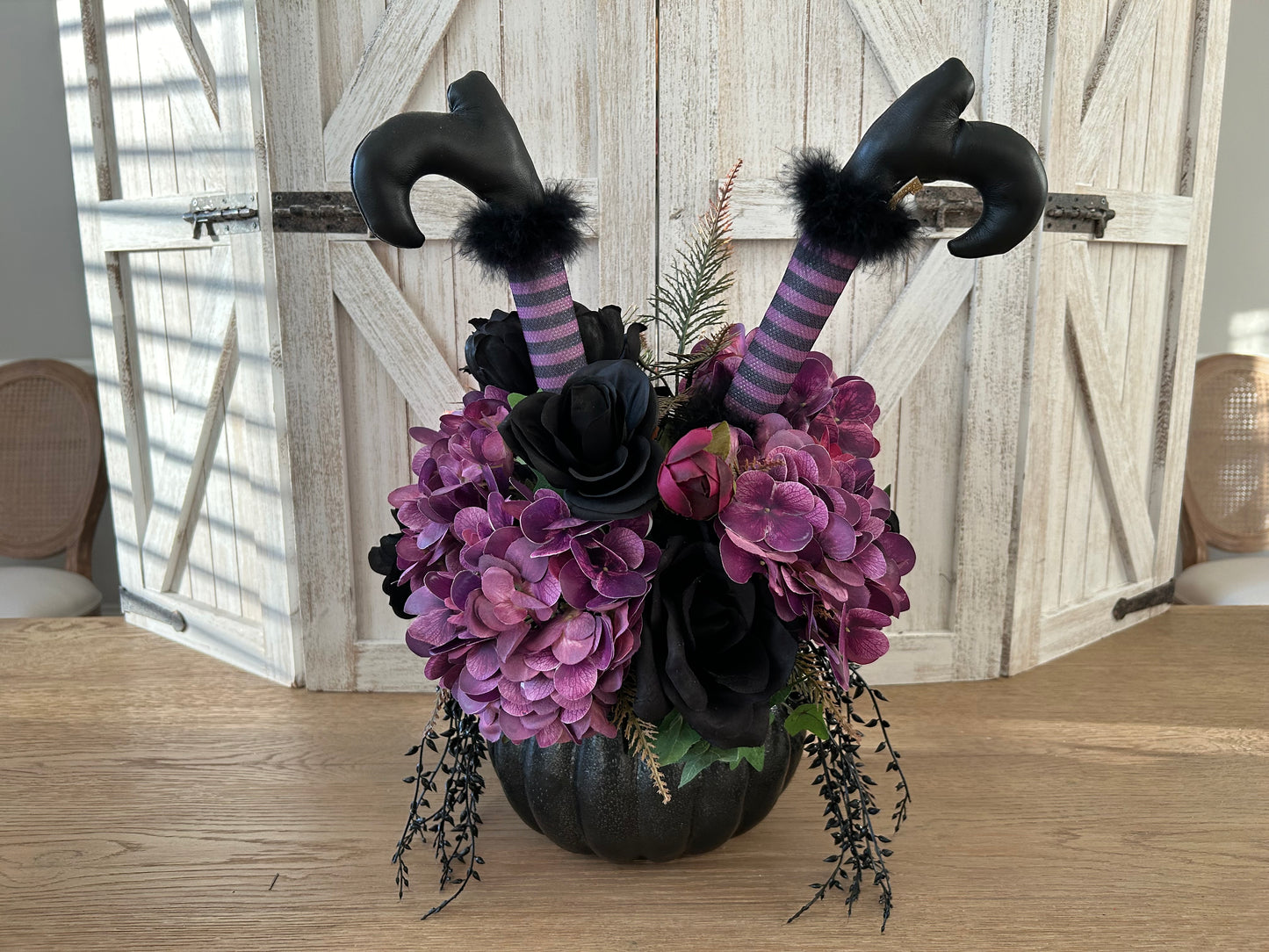 Arrangement for Sale - Halloween Arrangement with Witch Feet in a Black Pumpkin