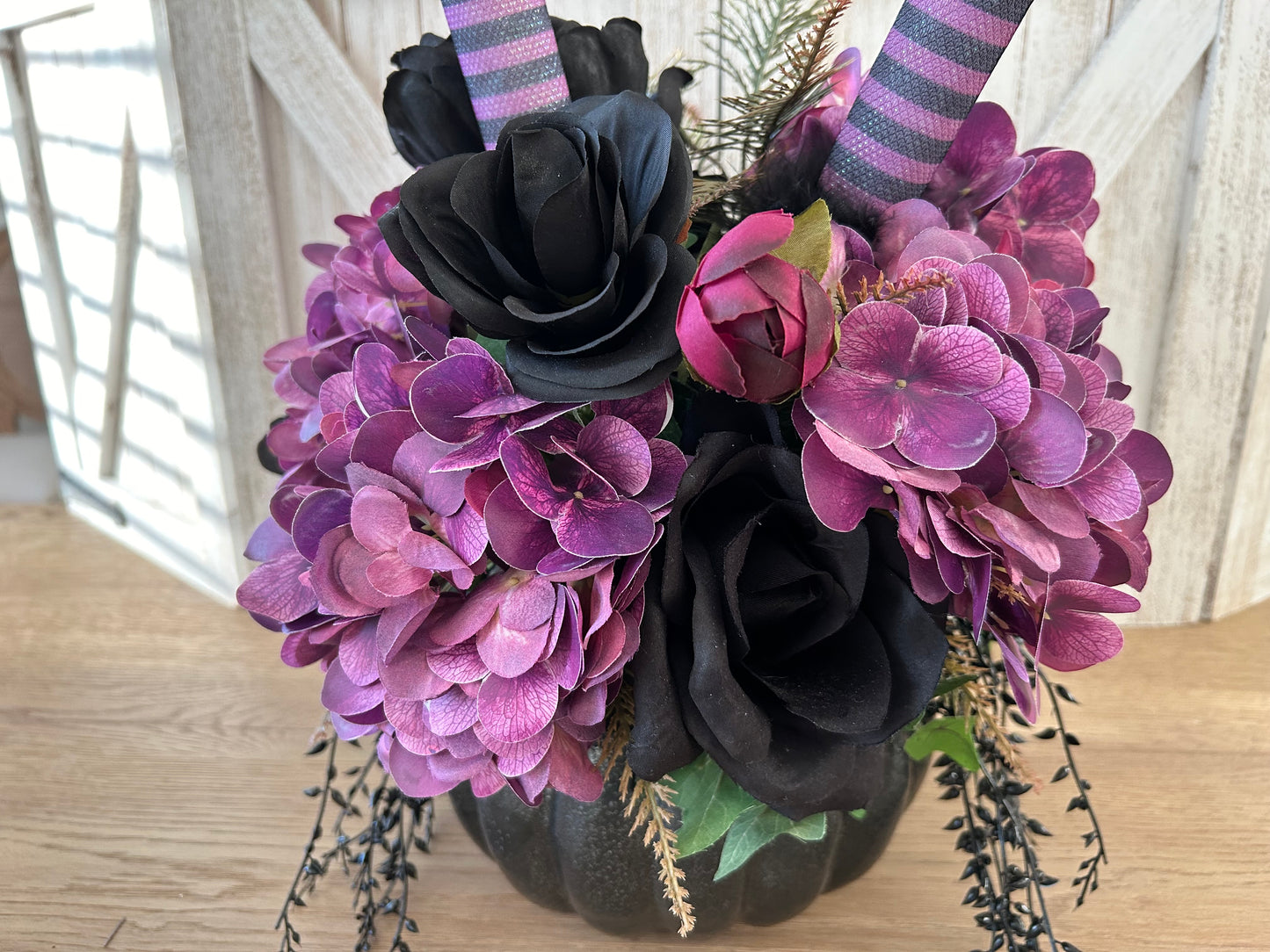 Arrangement for Sale - Halloween Arrangement with Witch Feet in a Black Pumpkin