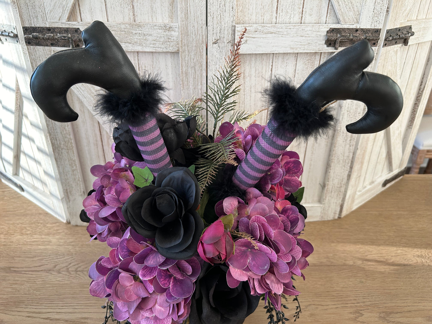 Arrangement for Sale - Halloween Arrangement with Witch Feet in a Black Pumpkin