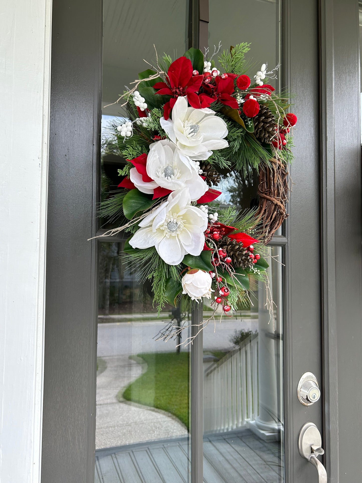 Wreath for Sale - Christmas White Magnolias and Red Poinsettias on 18" Grapevine