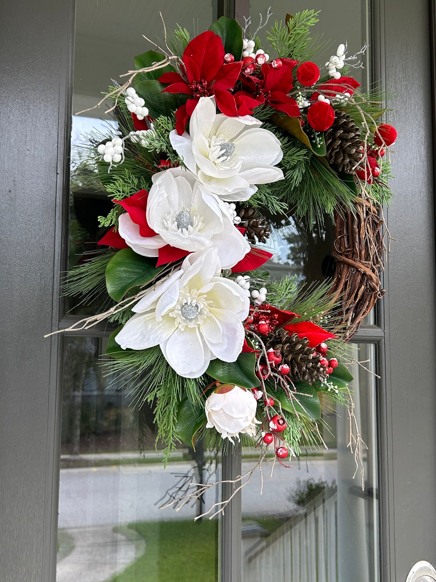 Wreath for Sale - Christmas White Magnolias and Red Poinsettias on 18" Grapevine