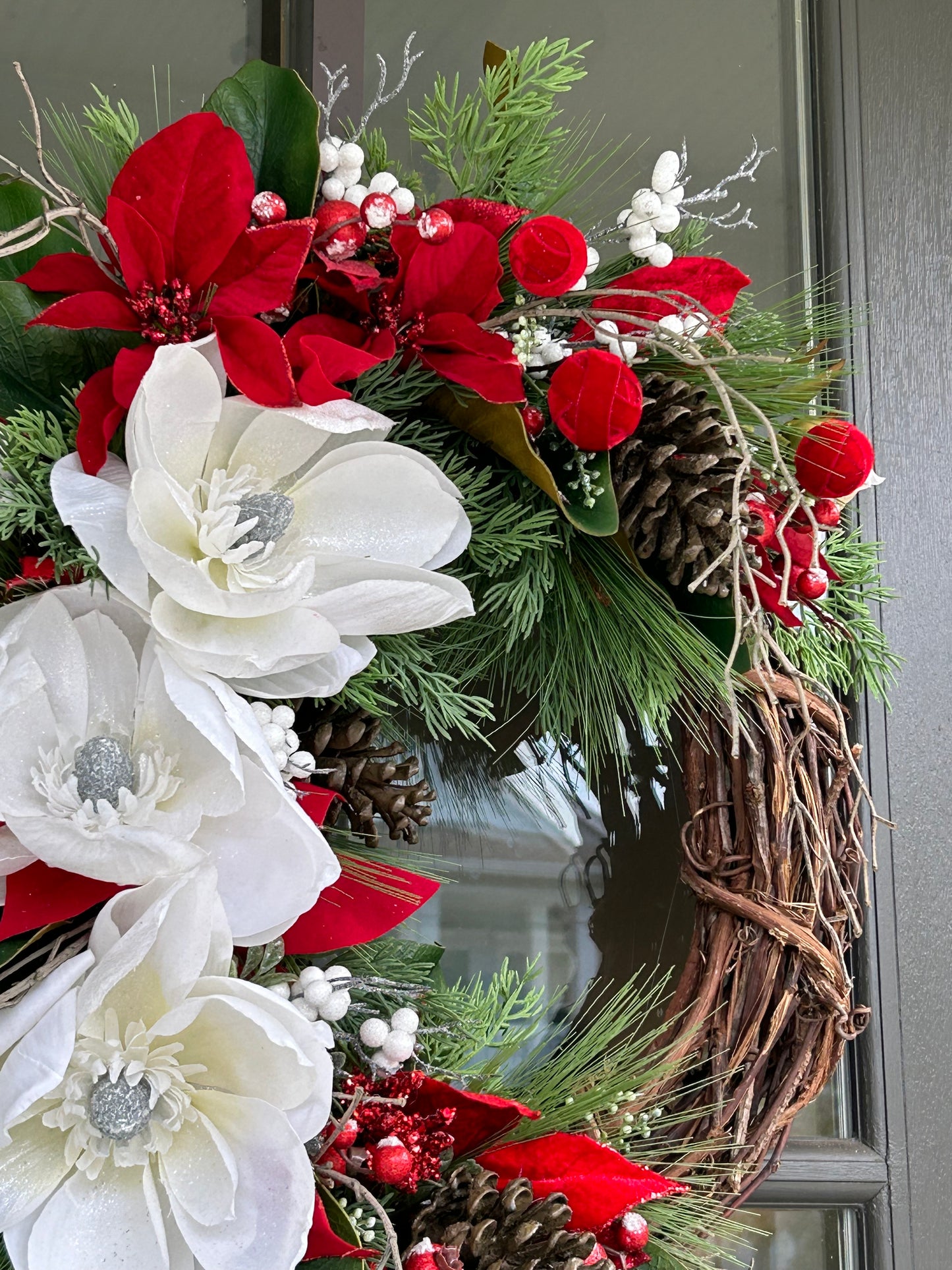 Wreath for Sale - Christmas White Magnolias and Red Poinsettias on 18" Grapevine