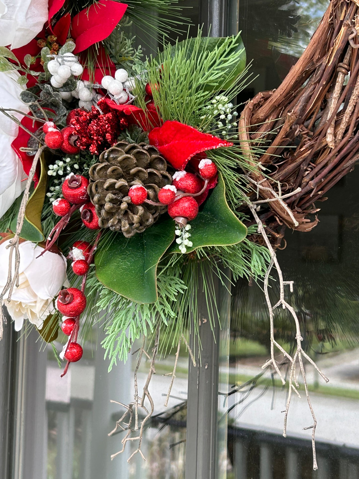 Wreath for Sale - Christmas White Magnolias and Red Poinsettias on 18" Grapevine