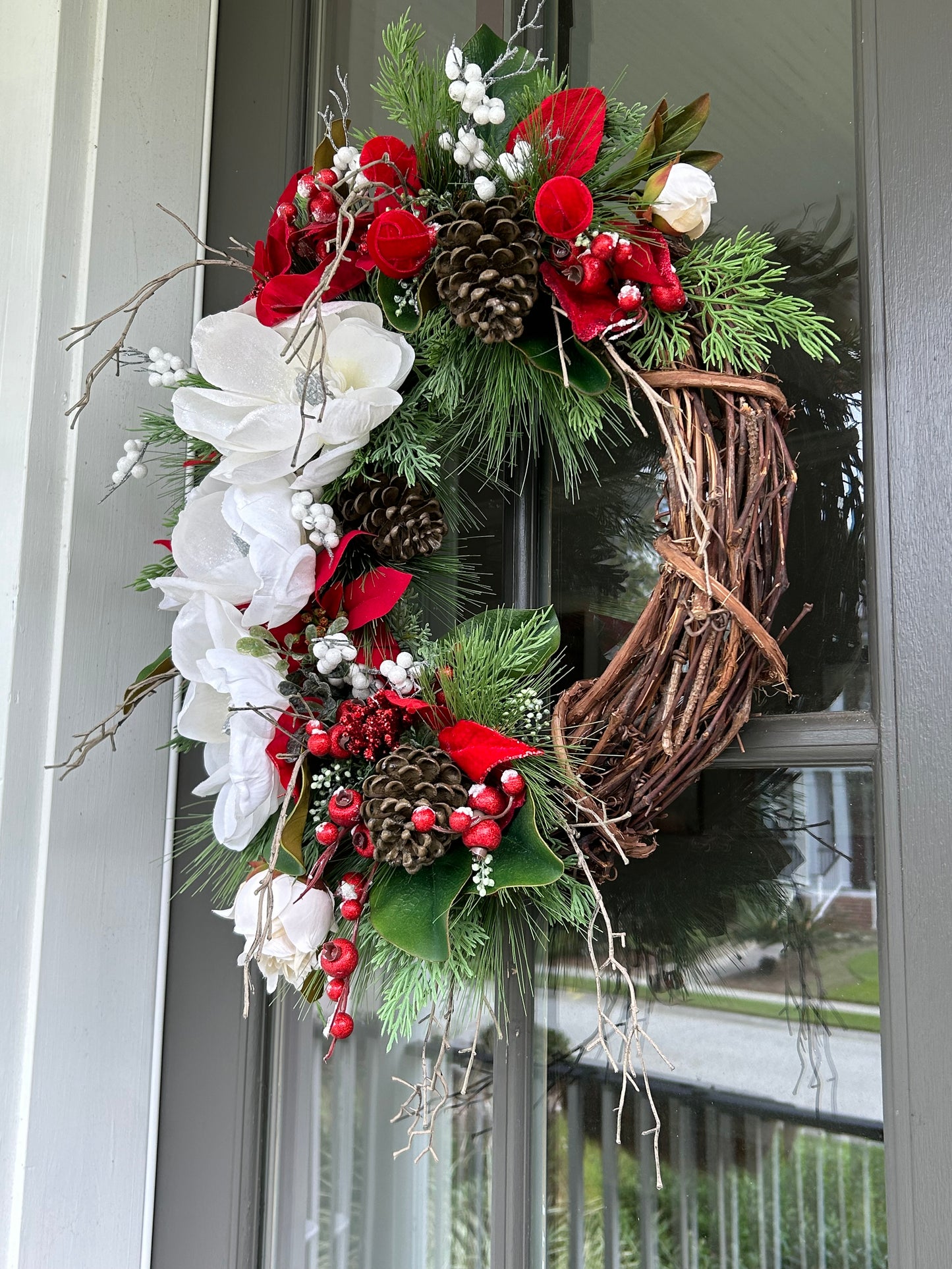 Wreath for Sale - Christmas White Magnolias and Red Poinsettias on 18" Grapevine